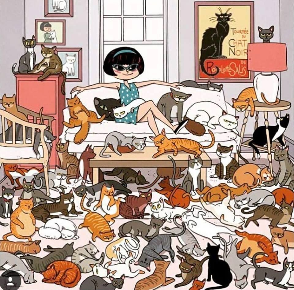 Женщина с кучей кошек
