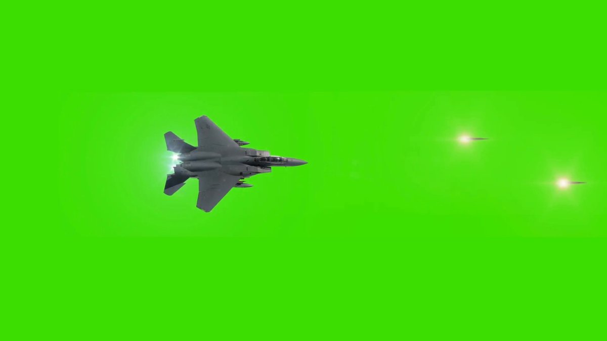 Истребитель на зеленом фоне